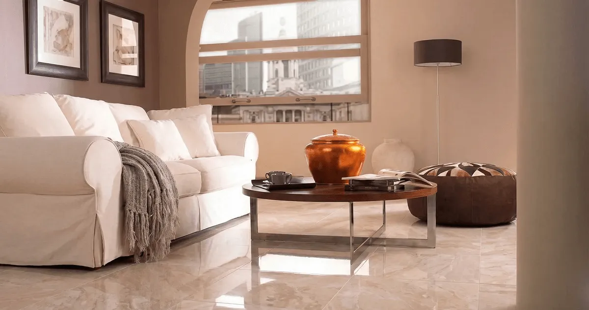Modern living room with professionally installed marble flooring, a beige sofa, coffee table in Spokane, WA
