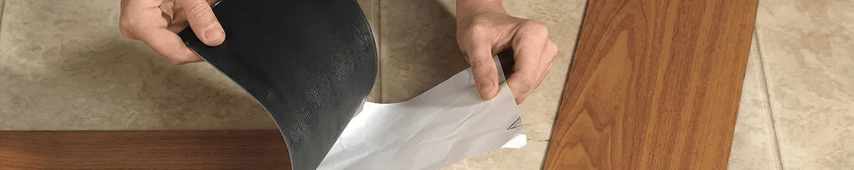 A professional installing vinyl flooring in Spokane, WA